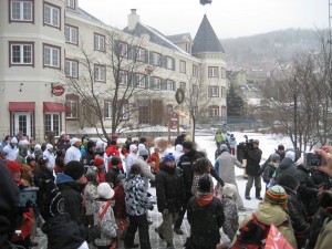 The Olympic flame draws a crowd of followers