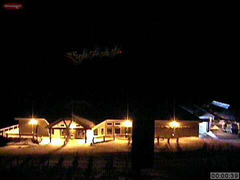 Confirmed By N.A.S.A.! Santa captured by the Tremblant Summit Web Cam, just after midnight as he flies towards your house!