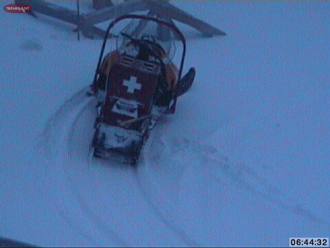 You can see the amount of new snow in these Skidoo tracks at the summit. This snap shot is just outside the Ski Patrol HQ.