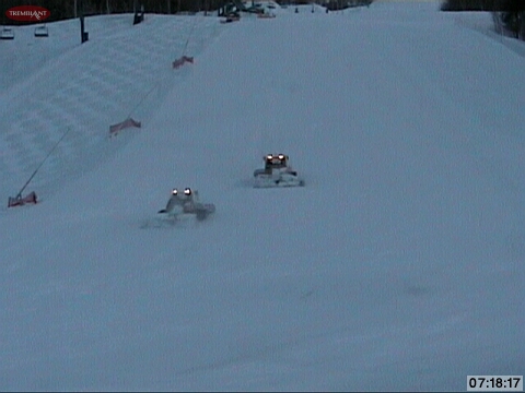 Efforts have been going on all night to whip things into shape and they are still working on it now as we see 2 groomers working in tandem to restore the main South side slope, Johannsen.